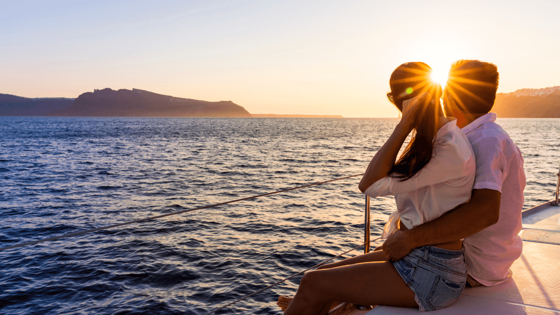 couple on a romantic boat trip during honeymoon